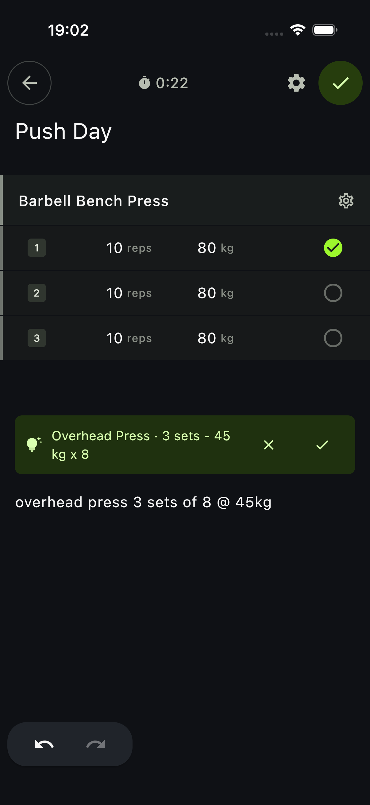 Notch strength workout tracker showing a fast log suggestion for overhead press